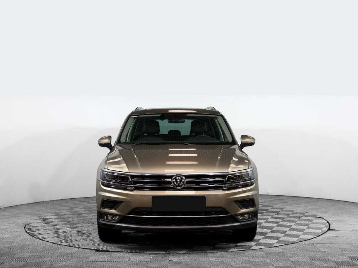 Купить Volkswagen Tiguan с пробегом. Посмотреть фото
