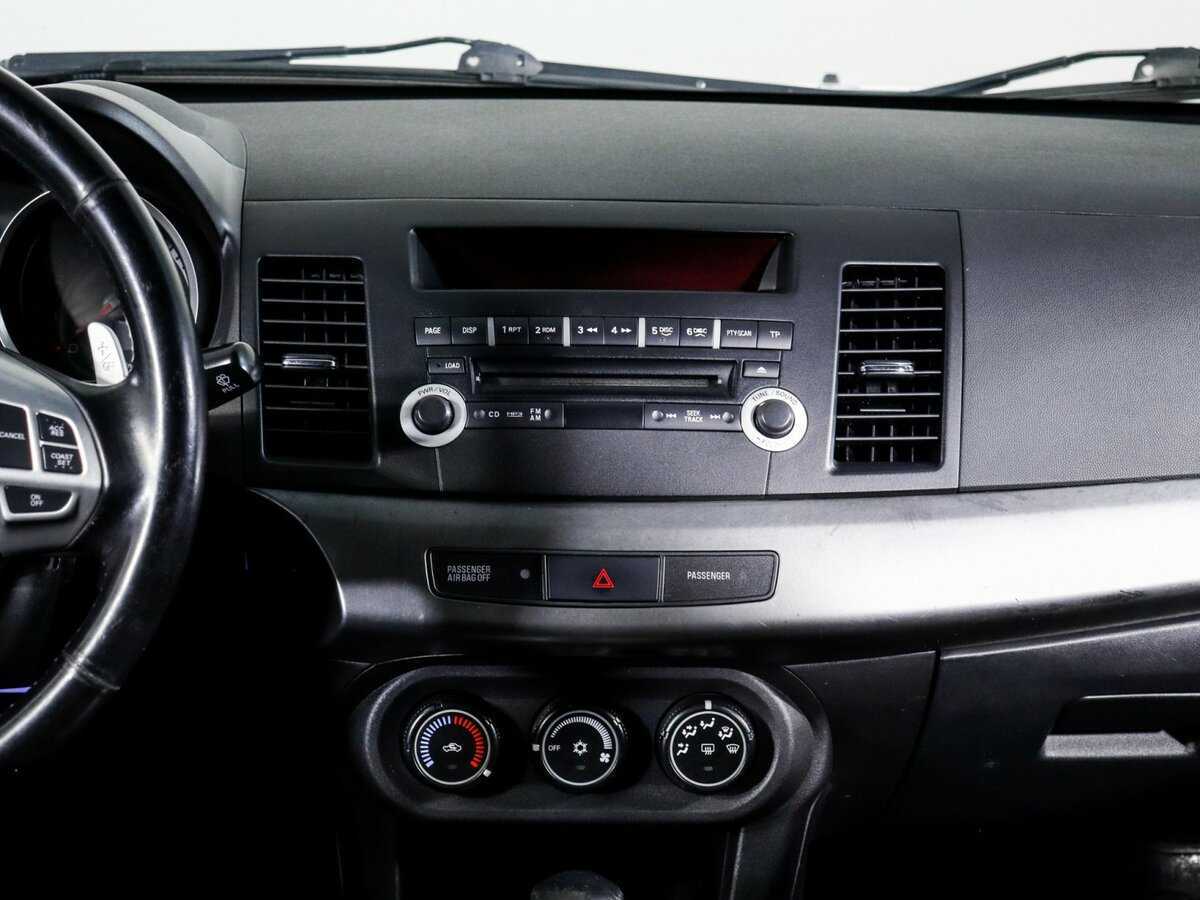 Купить Mitsubishi Lancer с пробегом. Фото: #9