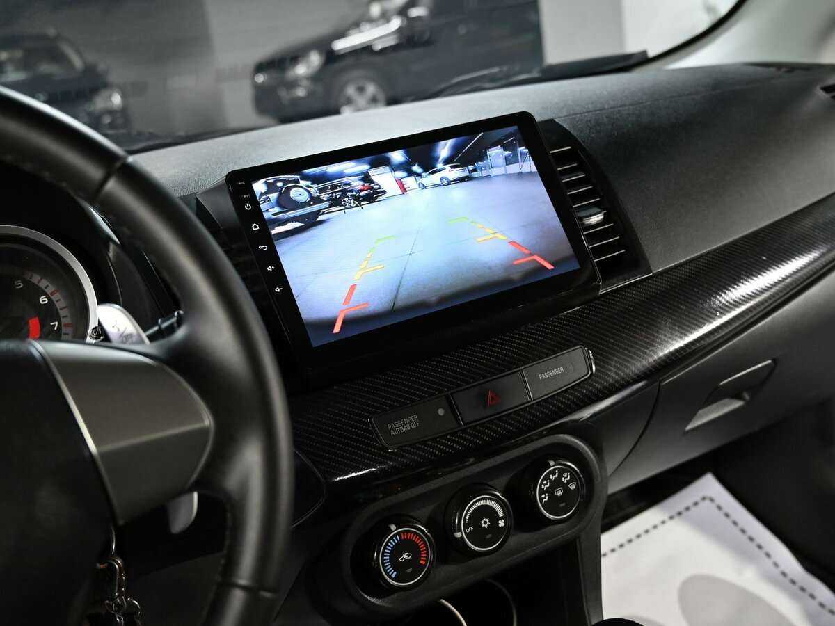 Купить Mitsubishi Lancer с пробегом. Фото: #10