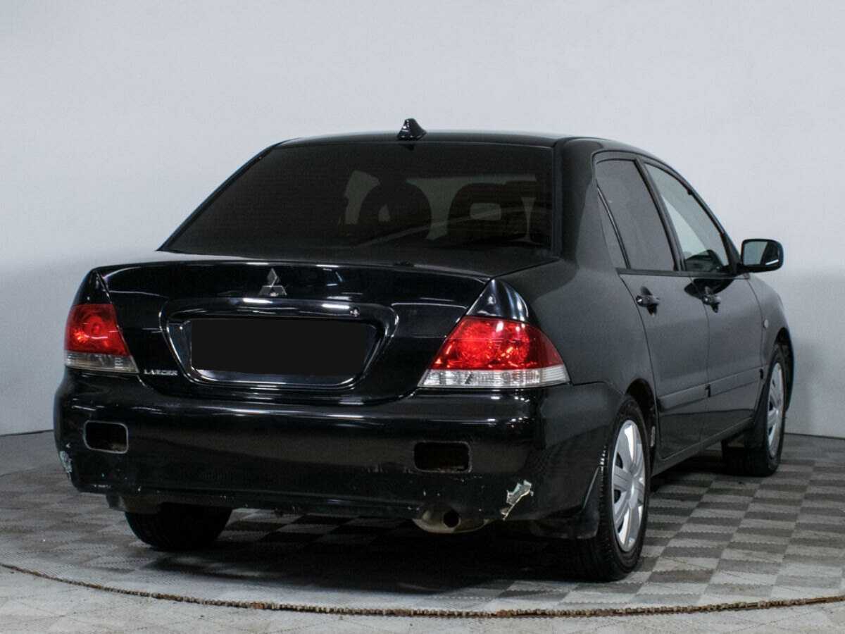 Купить Mitsubishi Lancer с пробегом. Фото: #3
