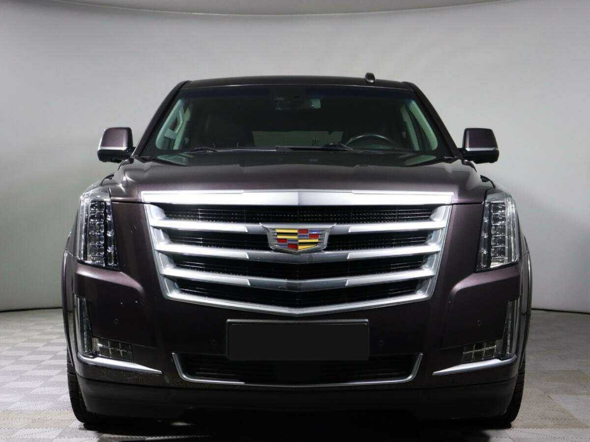 Купить Cadillac Escalade с пробегом. Посмотреть фото