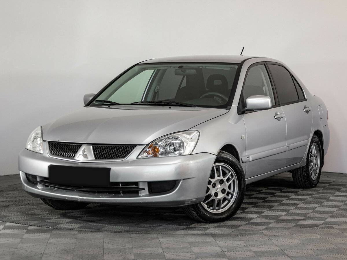 Купить Mitsubishi Lancer с пробегом. Посмотреть фото