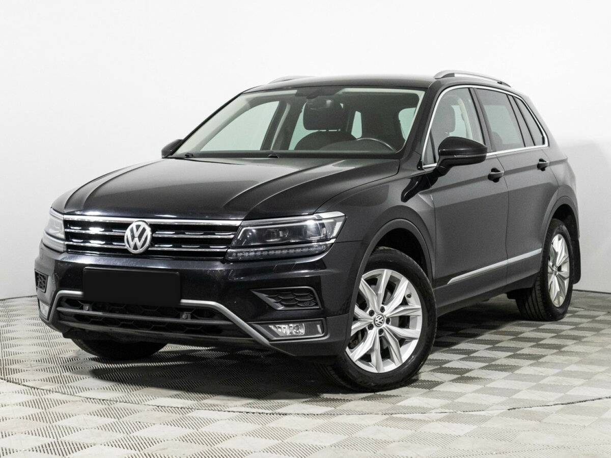Купить Volkswagen Tiguan с пробегом. Посмотреть фото