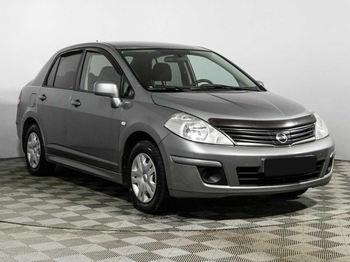 Купить Nissan Tiida с пробегом. Фото: #2