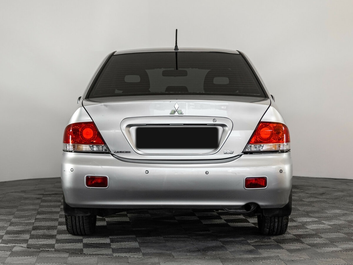Купить Mitsubishi Lancer с пробегом. Фото: #4