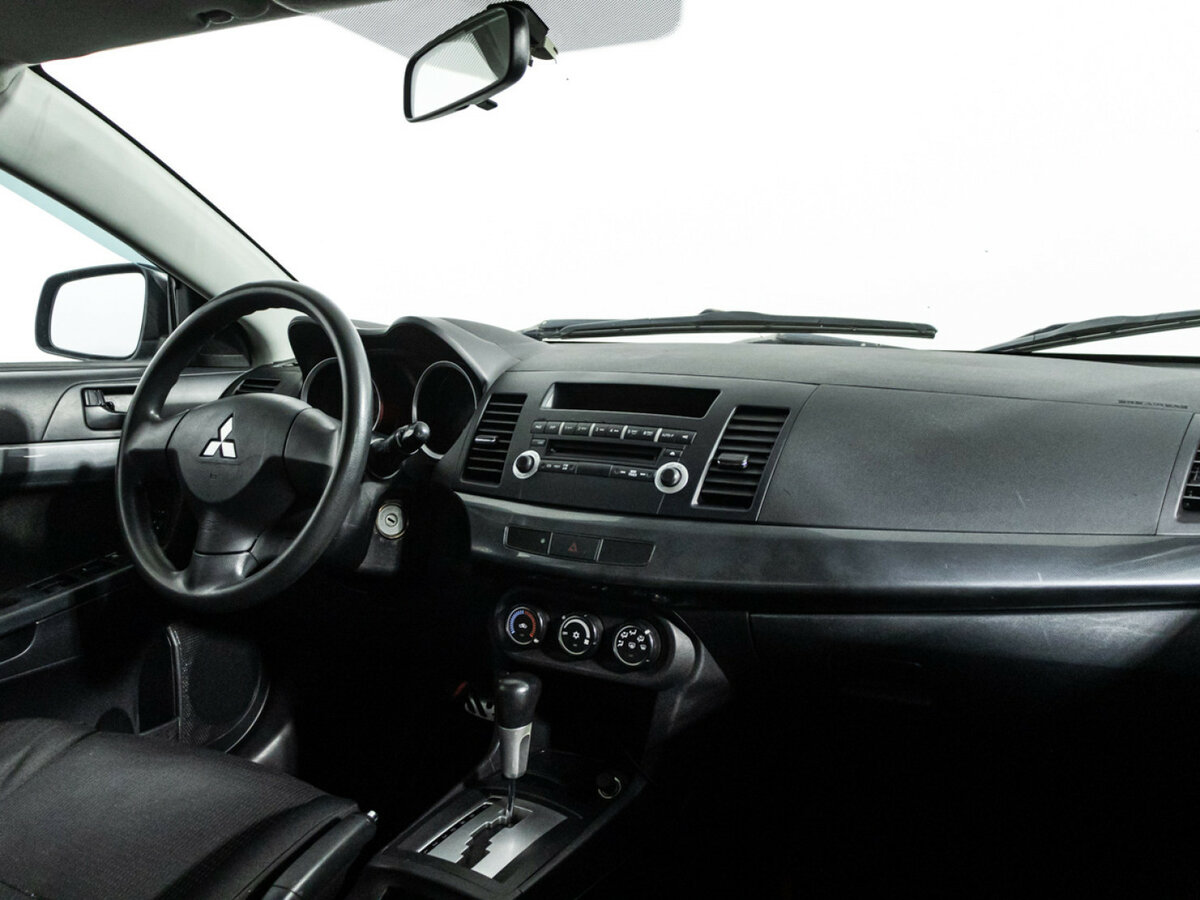 Купить Mitsubishi Lancer с пробегом. Фото: #8