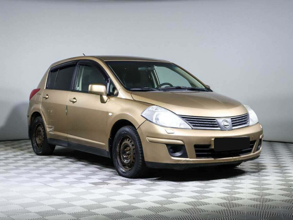Купить Nissan Tiida с пробегом. Фото: #2