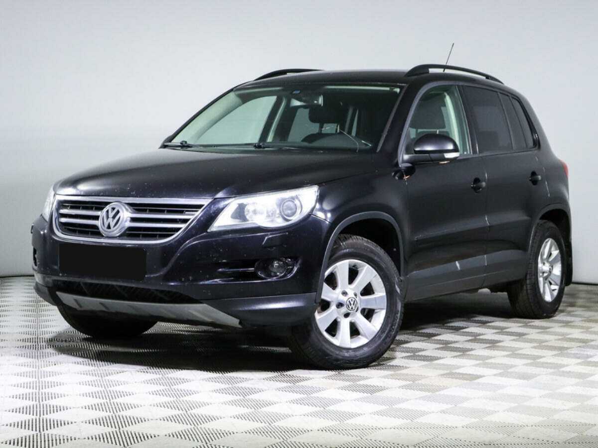 Купить Volkswagen Tiguan с пробегом. Посмотреть фото