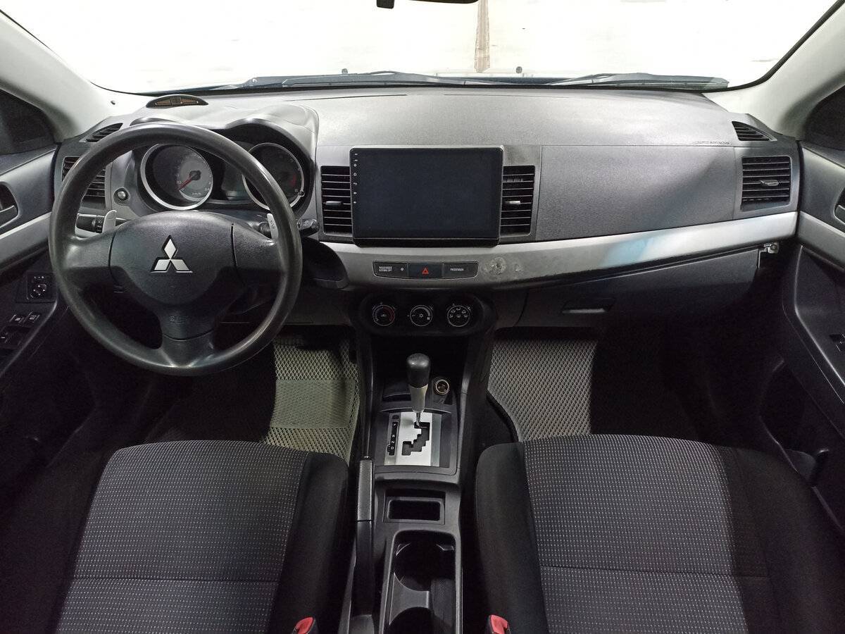 Купить Mitsubishi Lancer с пробегом. Фото: #13