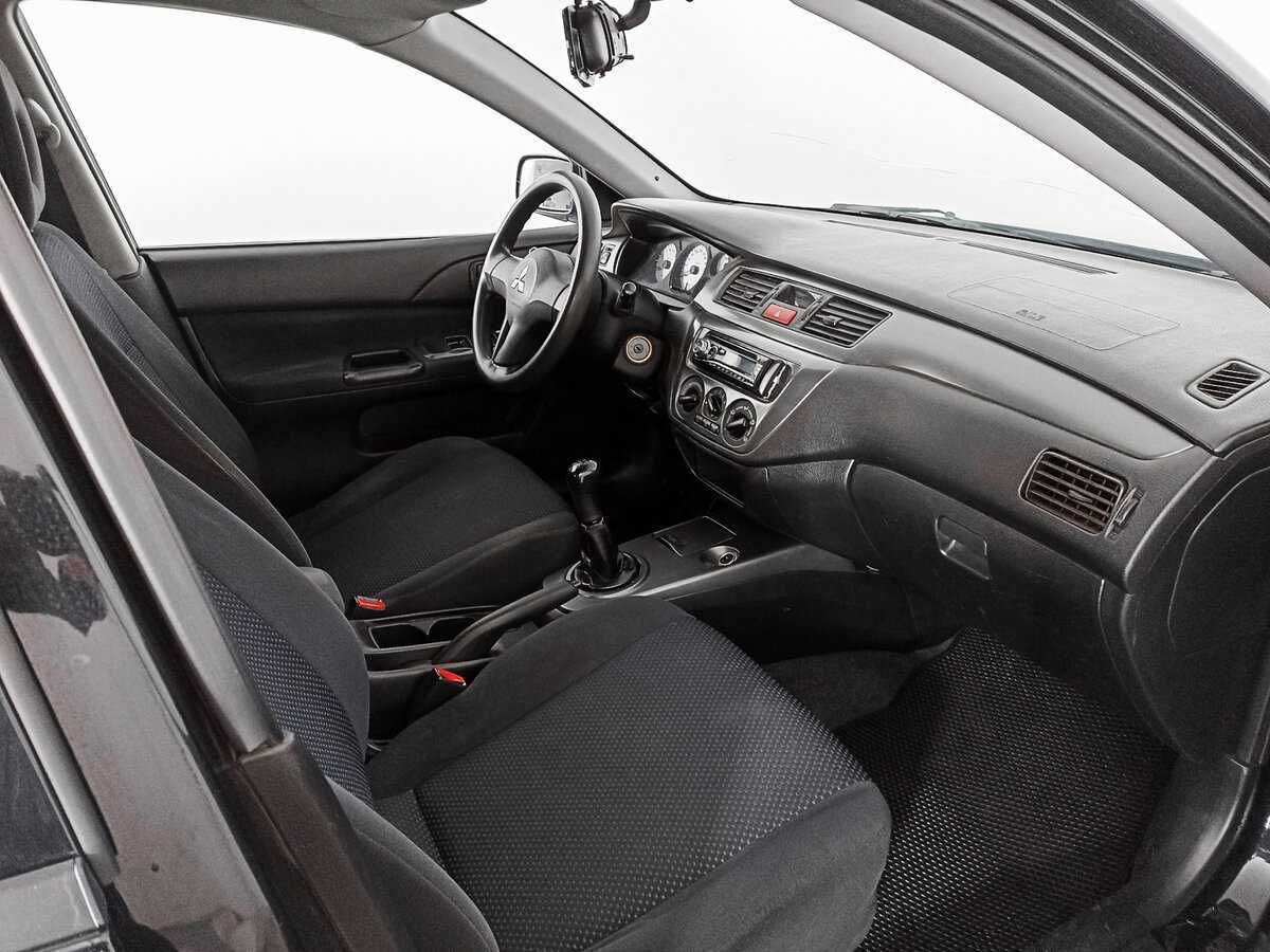 Купить Mitsubishi Lancer с пробегом. Фото: #6