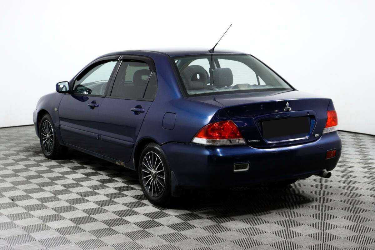 Купить Mitsubishi Lancer с пробегом. Фото: #6