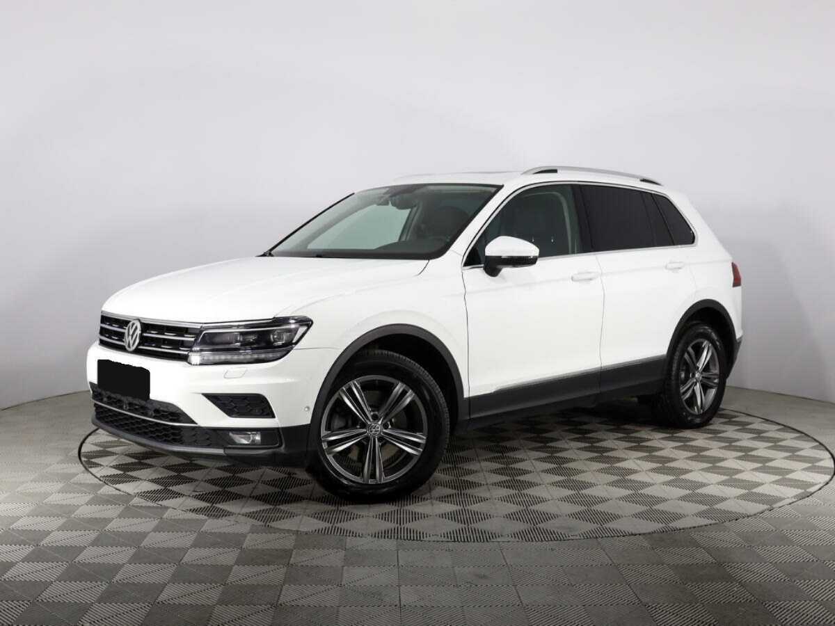 Купить Volkswagen Tiguan с пробегом. Посмотреть фото