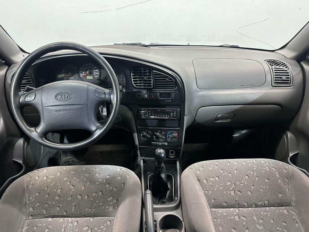 Купить Kia Spectra с пробегом. Фото: #8