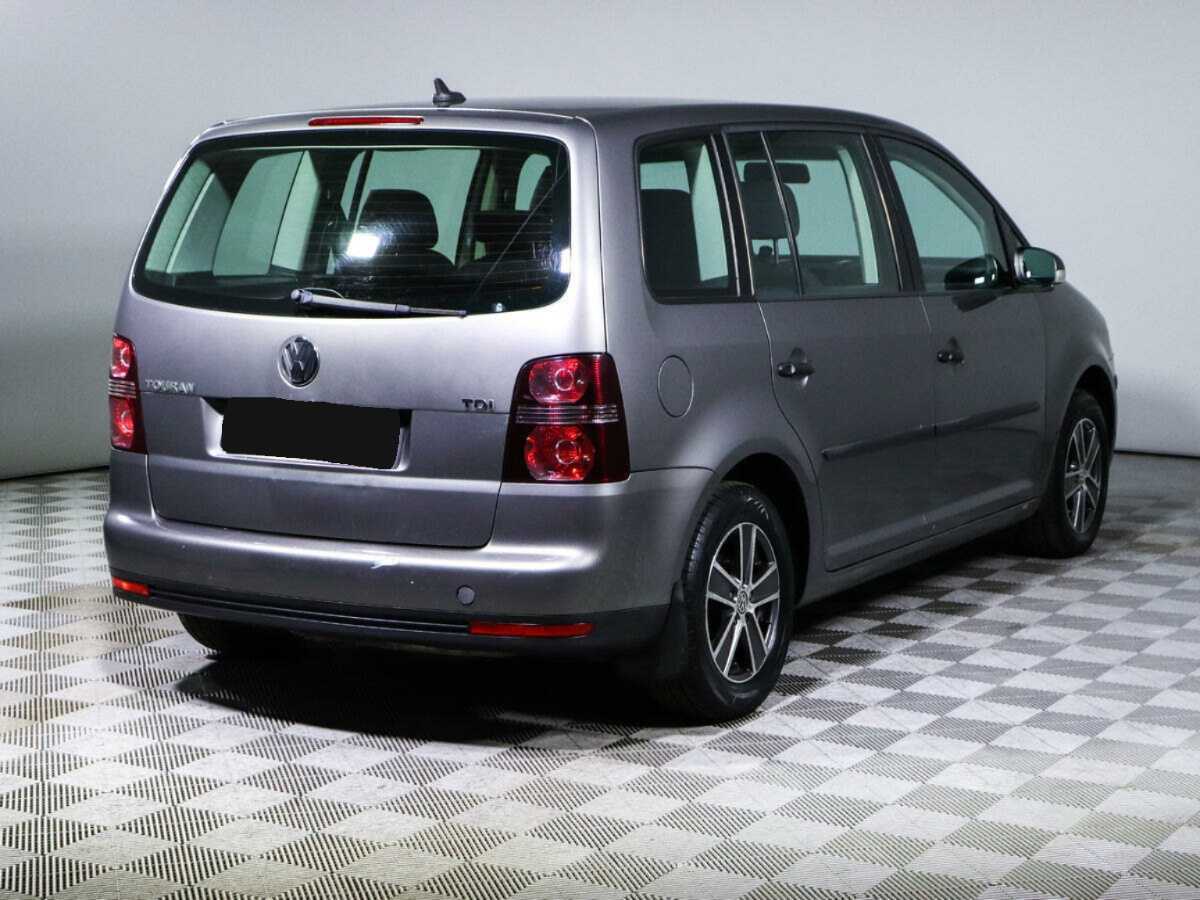 Купить Volkswagen Touran с пробегом. Фото: #4