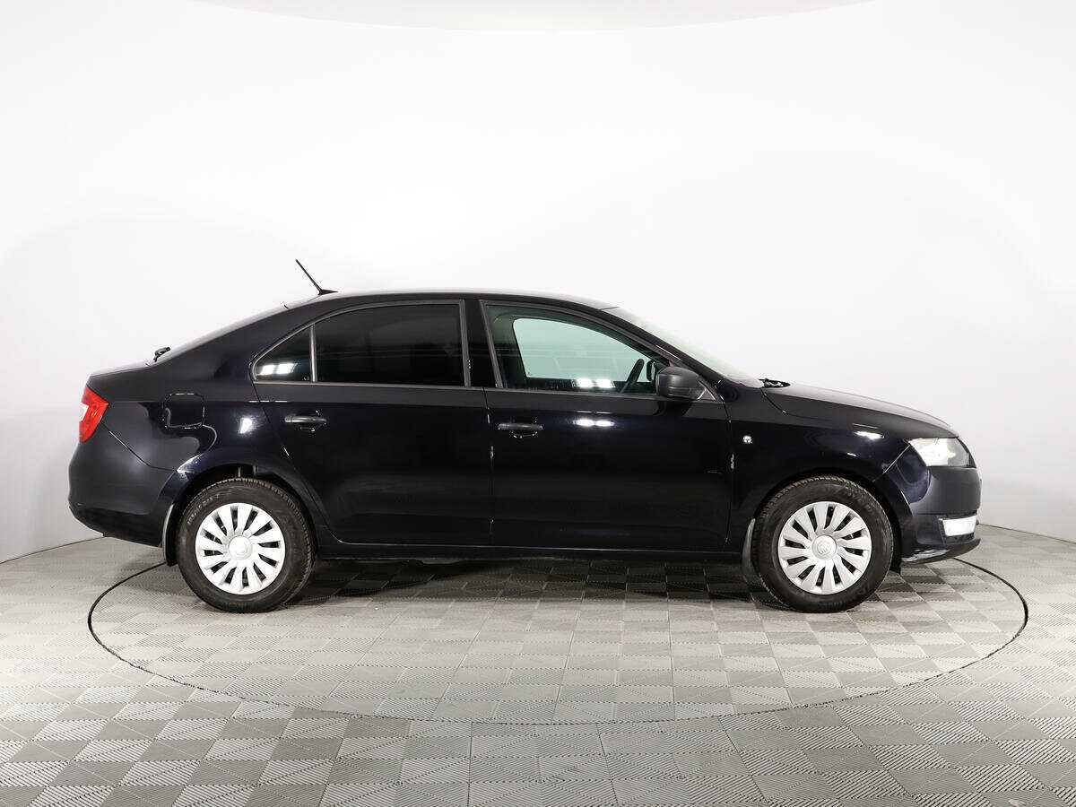 Купить Skoda Rapid с пробегом. Фото: #4