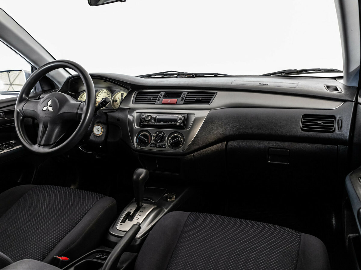 Купить Mitsubishi Lancer с пробегом. Фото: #6