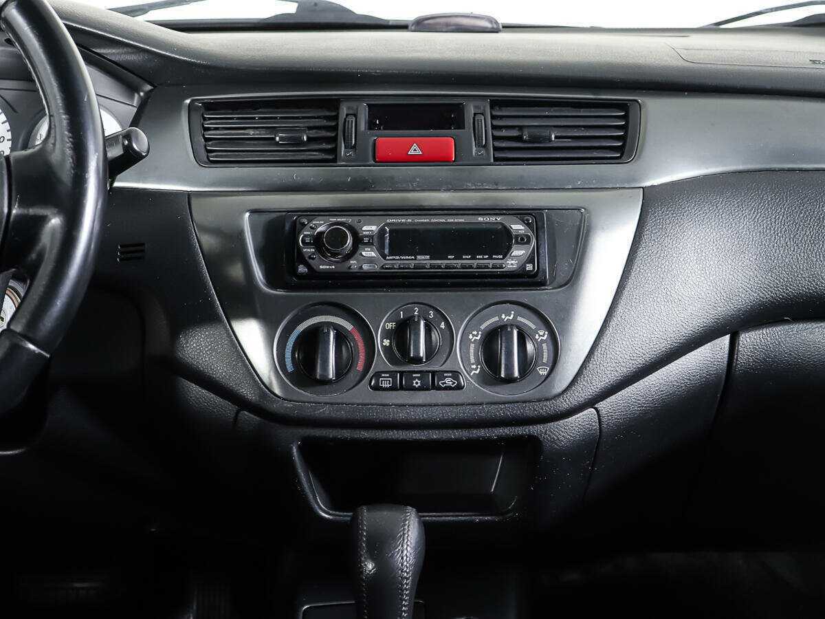 Купить Mitsubishi Lancer с пробегом. Фото: #11