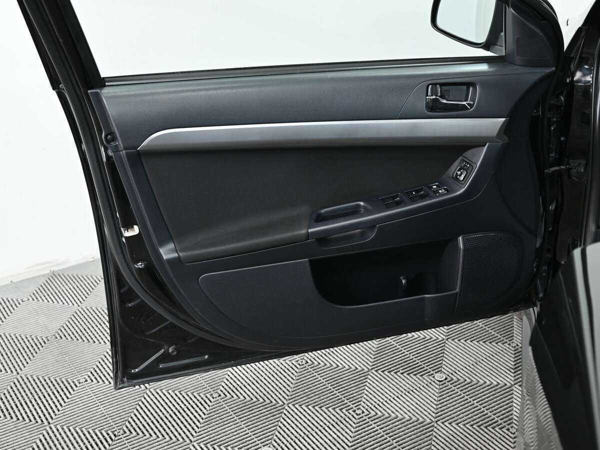 Купить Mitsubishi Lancer с пробегом. Фото: #7