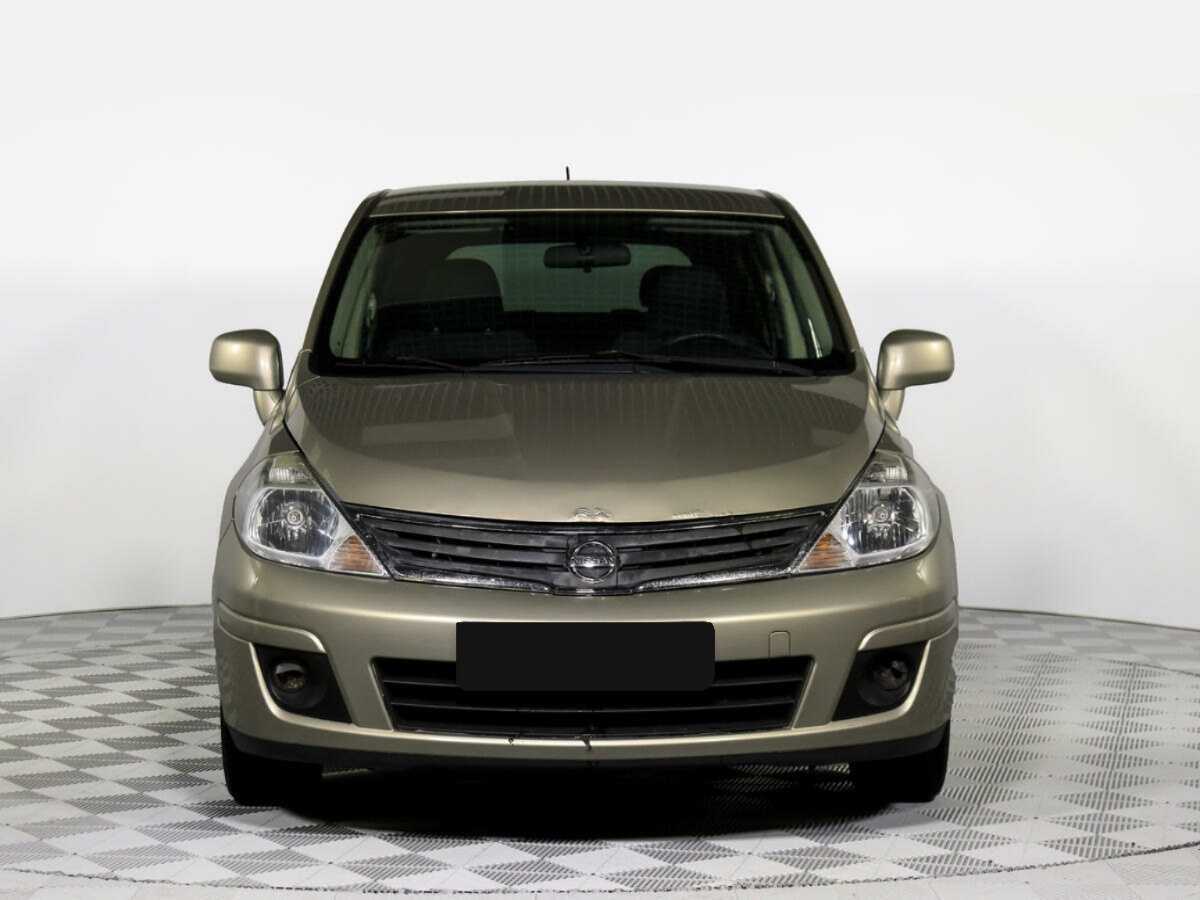 Купить Nissan Tiida с пробегом. Посмотреть фото