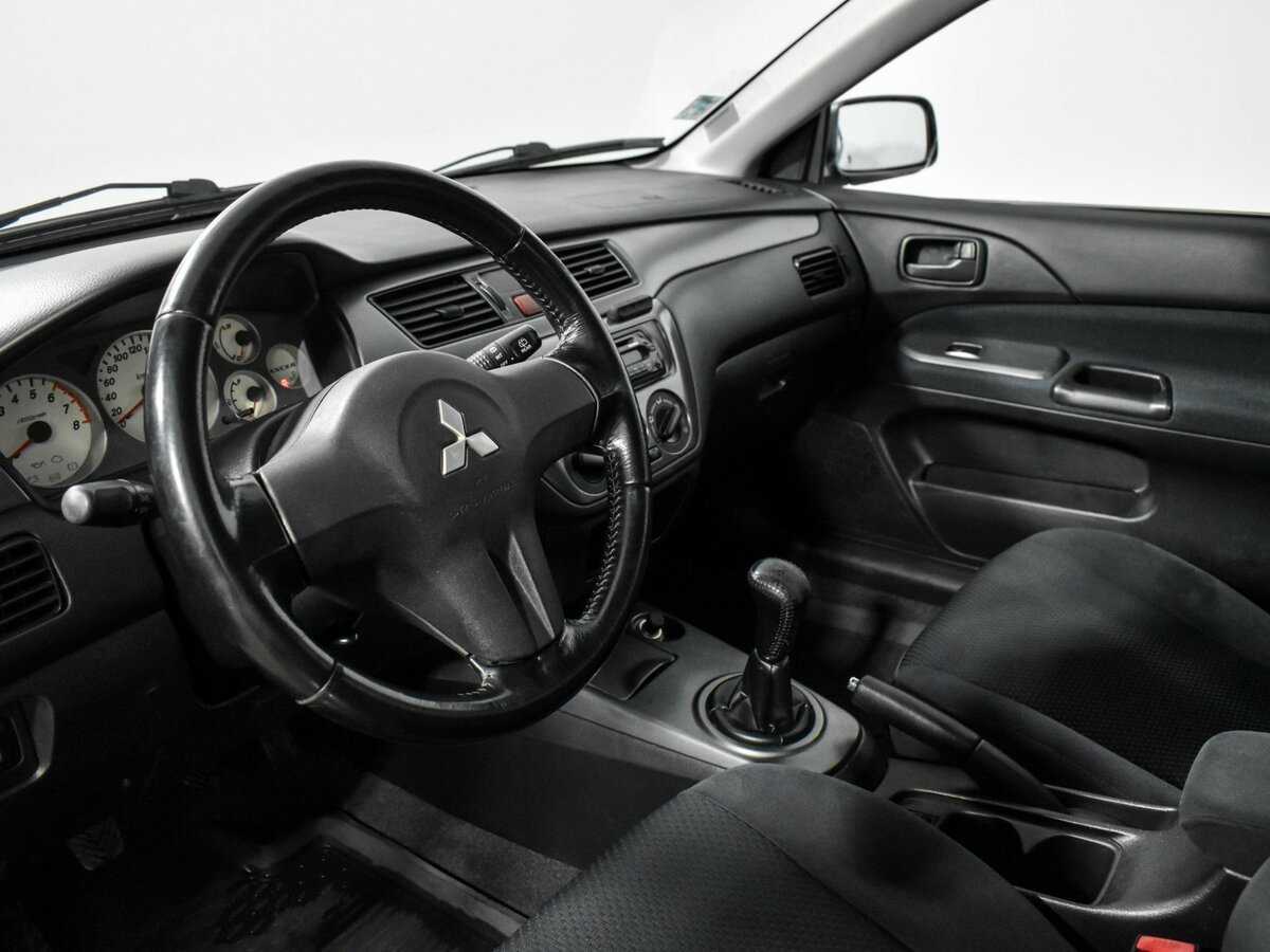 Купить Mitsubishi Lancer с пробегом. Фото: #5