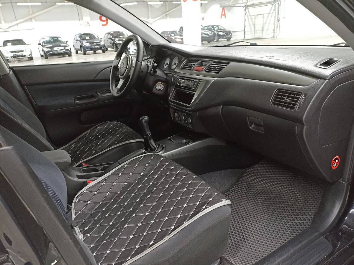 Купить Mitsubishi Lancer с пробегом. Фото: #10