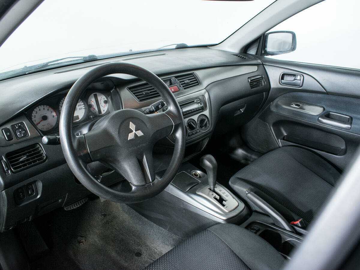 Купить Mitsubishi Lancer с пробегом. Фото: #12