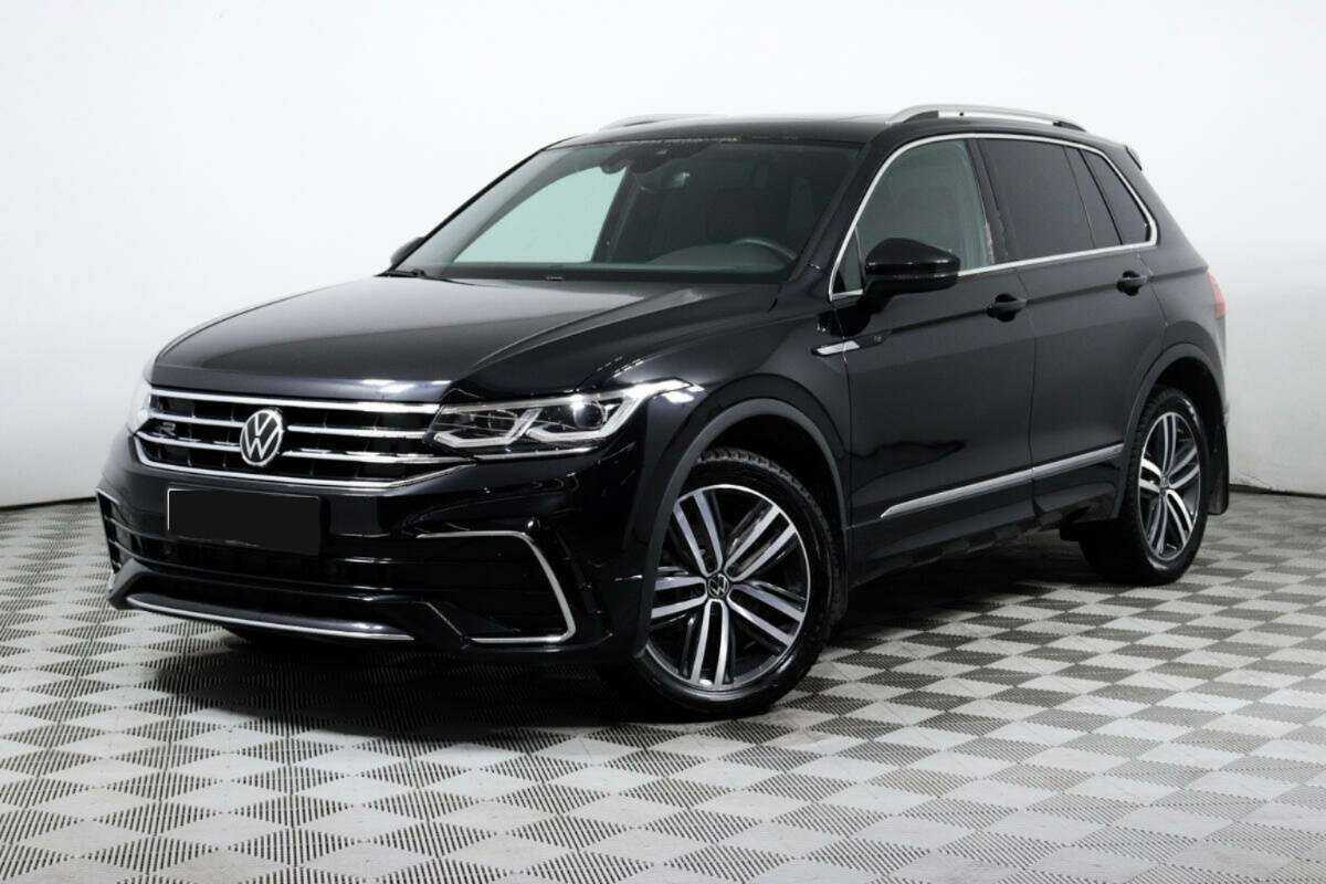 Купить Volkswagen Tiguan с пробегом. Посмотреть фото