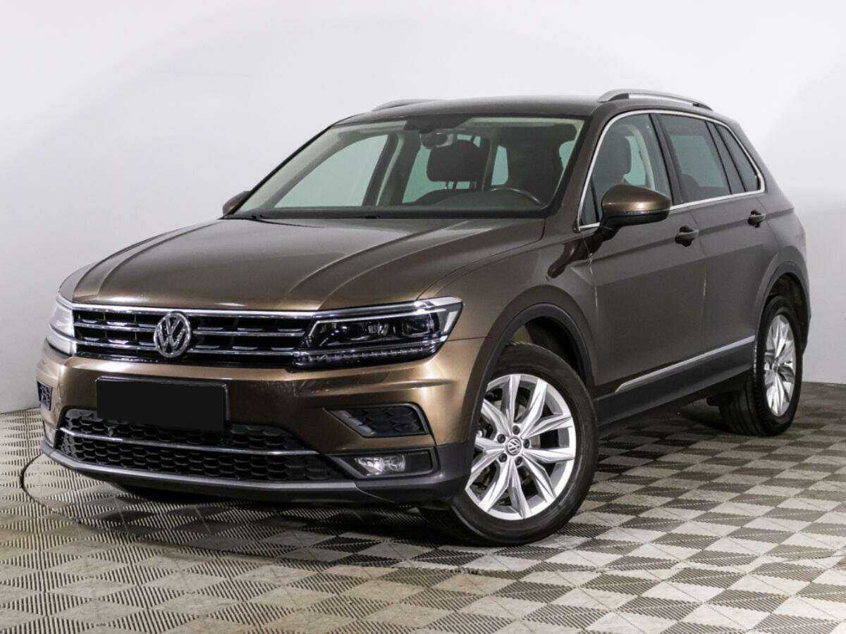 Купить Volkswagen Tiguan с пробегом. Посмотреть фото