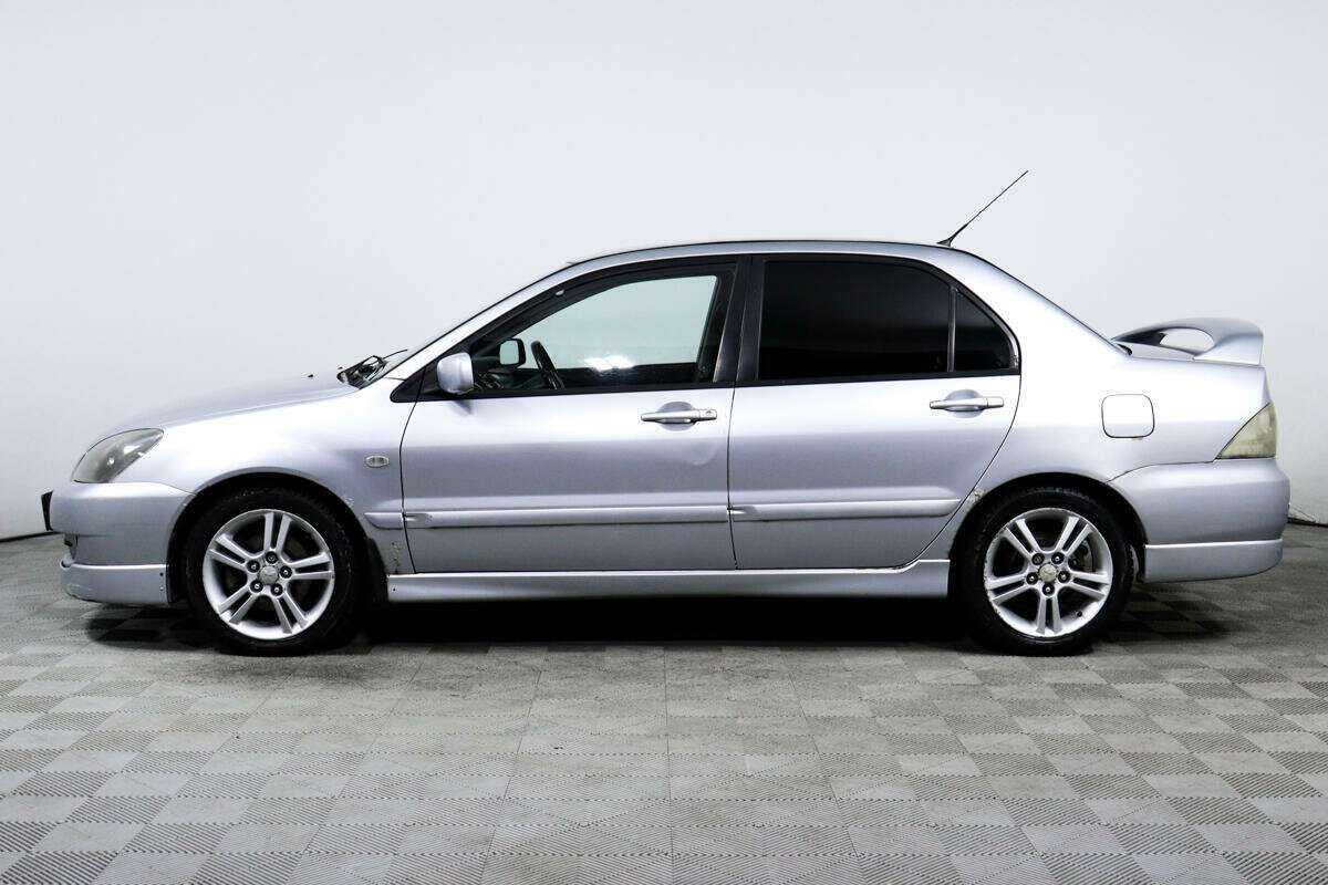 Купить Mitsubishi Lancer с пробегом. Фото: #7