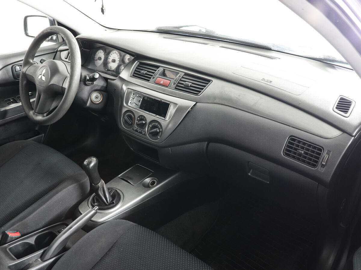 Купить Mitsubishi Lancer с пробегом. Фото: #5