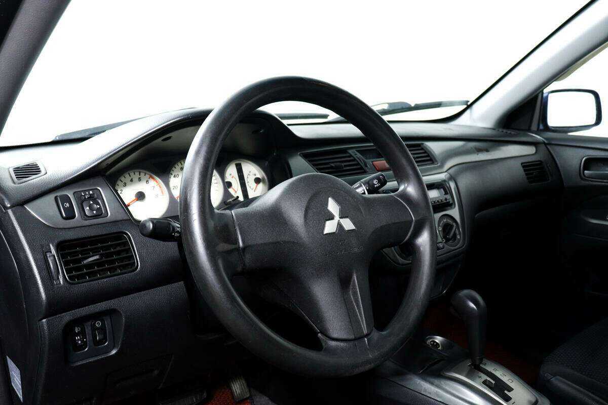 Купить Mitsubishi Lancer с пробегом. Фото: #12