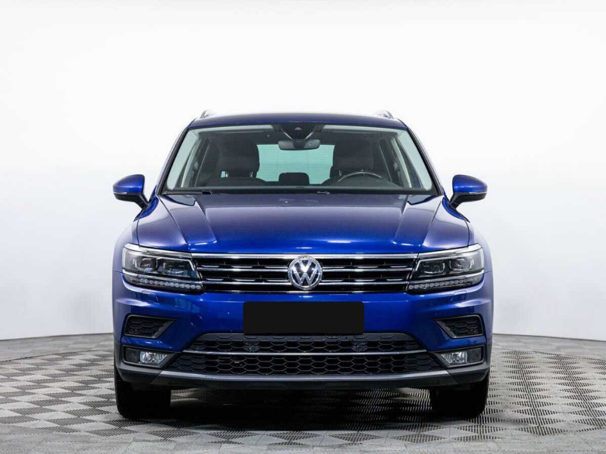Купить Volkswagen Tiguan с пробегом. Посмотреть фото