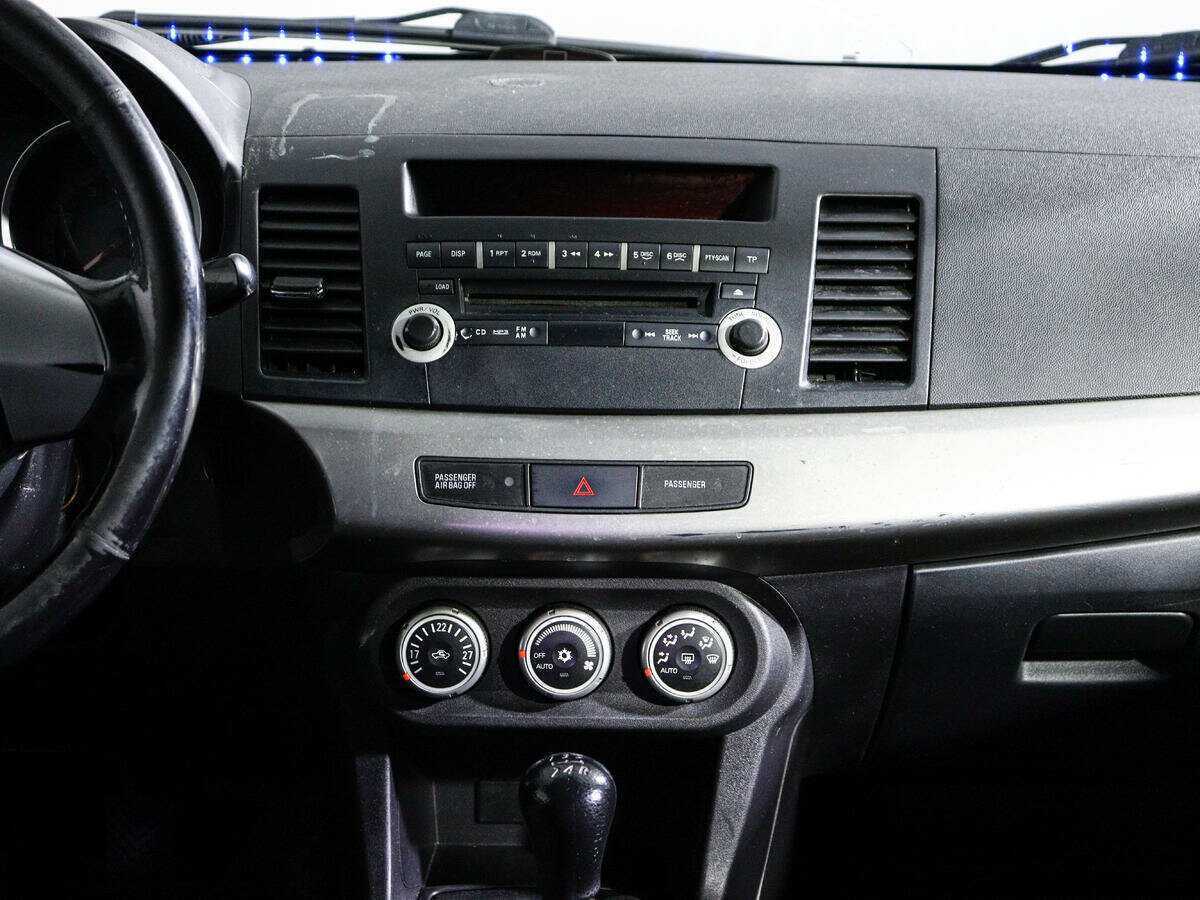 Купить Mitsubishi Lancer с пробегом. Фото: #10