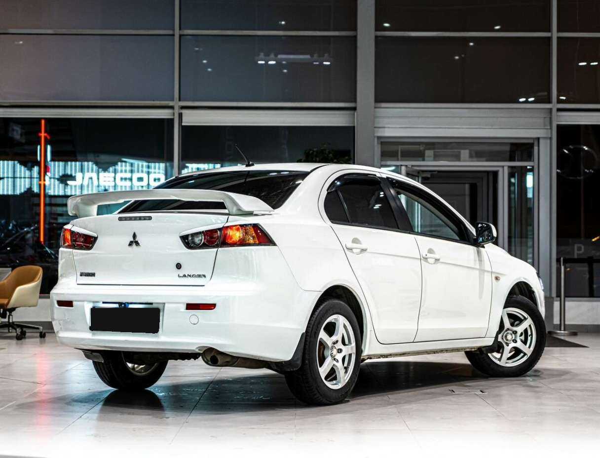 Купить Mitsubishi Lancer с пробегом. Фото: #2
