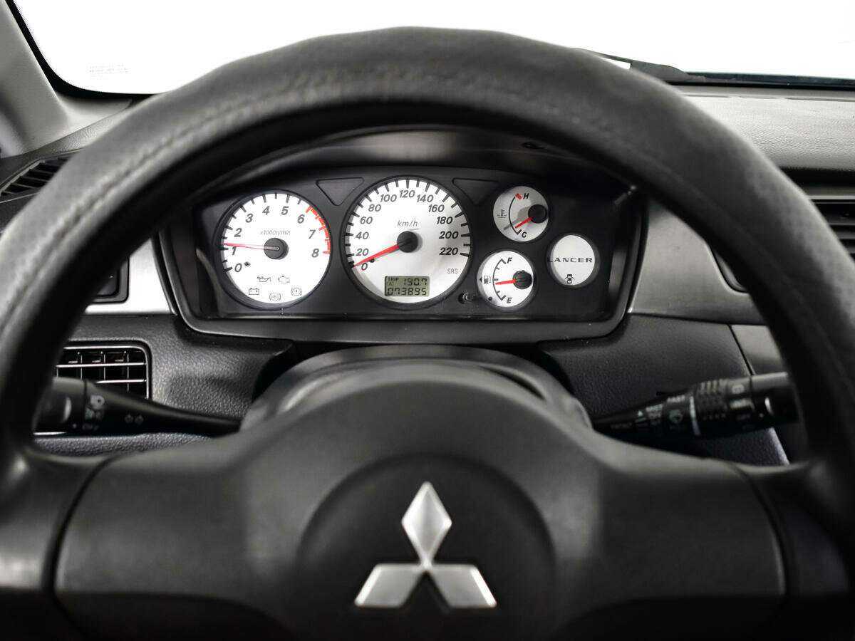 Купить Mitsubishi Lancer с пробегом. Фото: #10