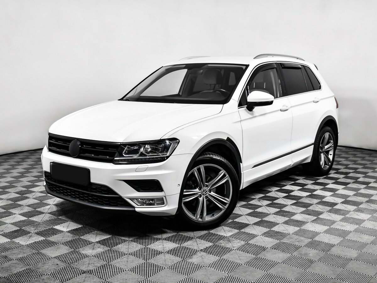 Купить Volkswagen Tiguan с пробегом. Посмотреть фото