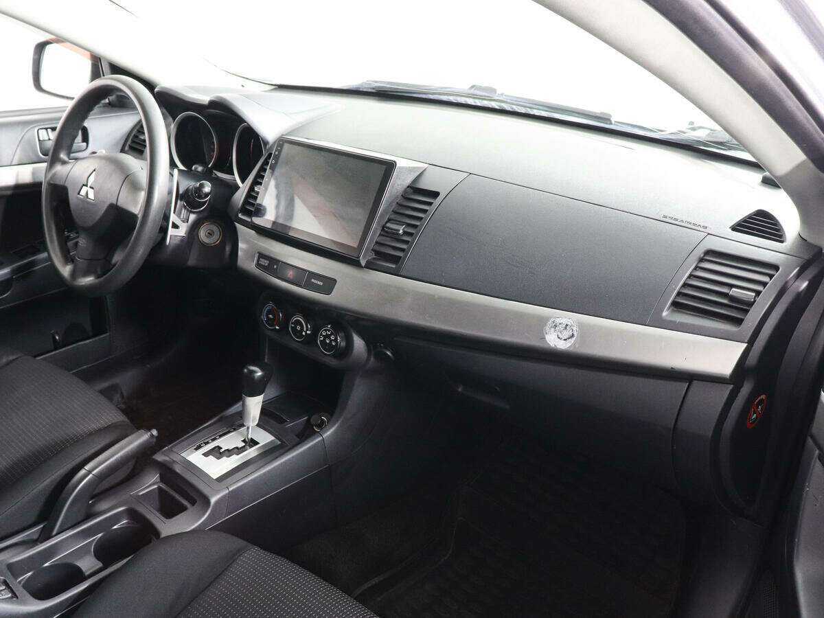 Купить Mitsubishi Lancer с пробегом. Фото: #9