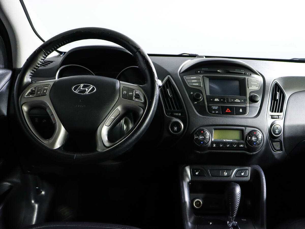 Купить Hyundai ix35 с пробегом. Фото: #11