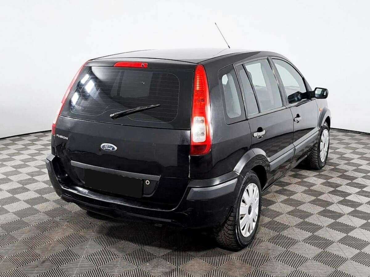 Купить Ford Fusion с пробегом. Фото: #4