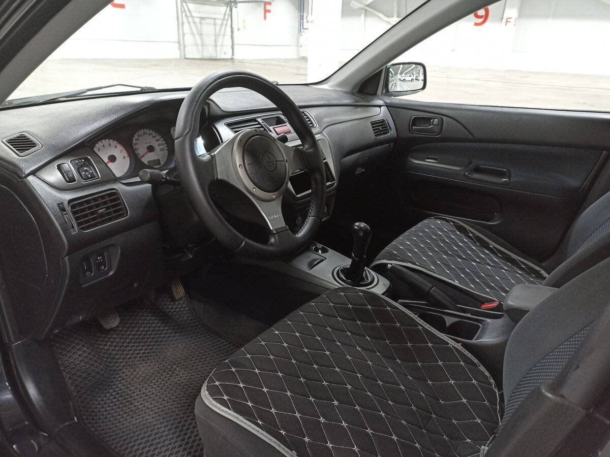 Купить Mitsubishi Lancer с пробегом. Фото: #15