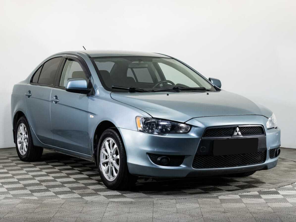 Купить Mitsubishi Lancer с пробегом. Фото: #2