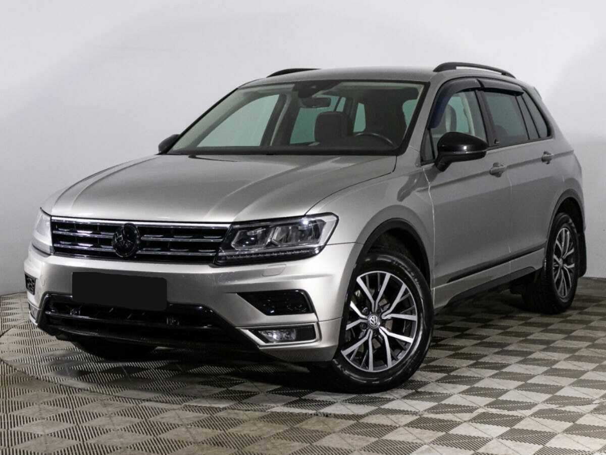 Купить Volkswagen Tiguan с пробегом. Посмотреть фото