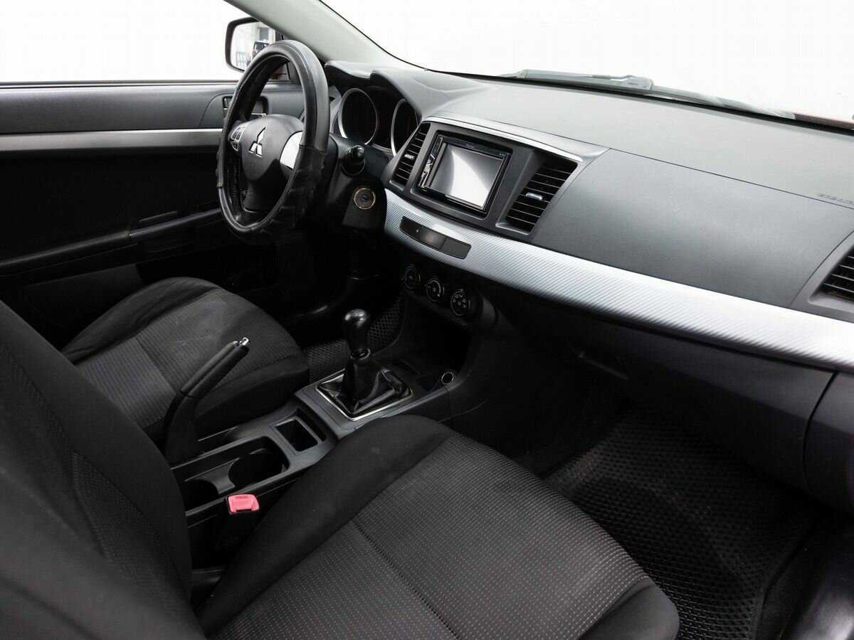 Купить Mitsubishi Lancer с пробегом. Фото: #10
