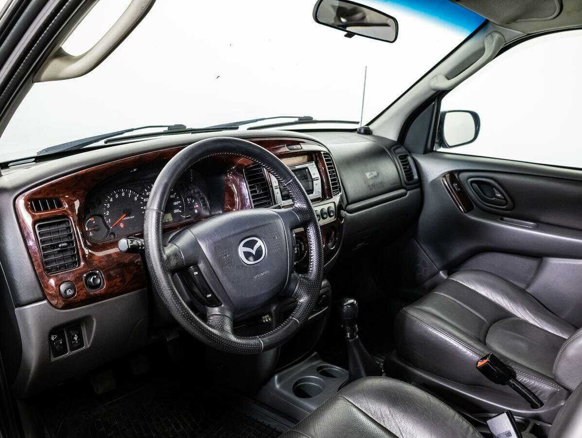 Купить Mazda Tribute с пробегом. Фото: #8