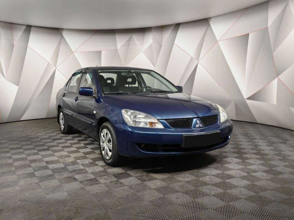 Купить Mitsubishi Lancer с пробегом. Фото: #2
