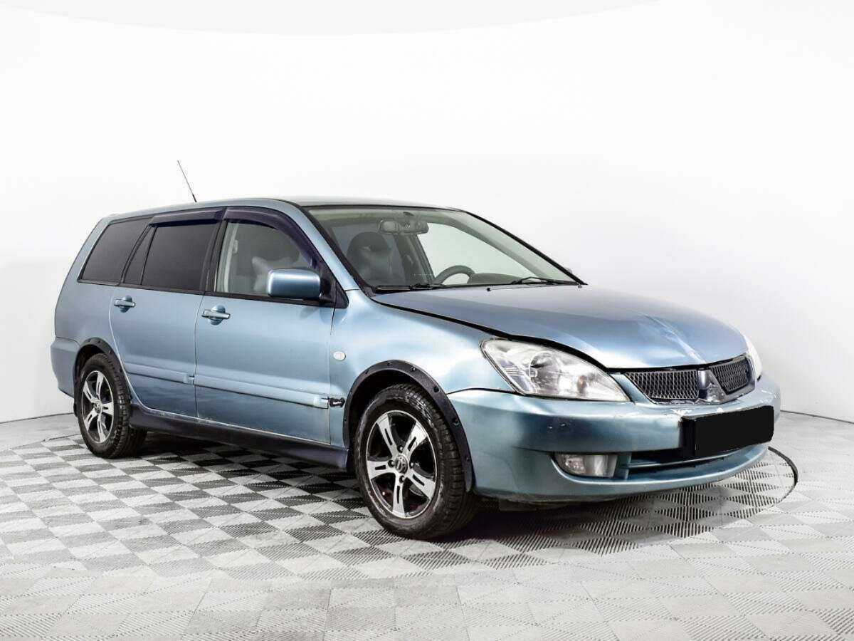 Купить Mitsubishi Lancer с пробегом. Фото: #2