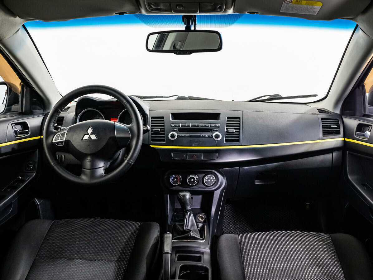 Купить Mitsubishi Lancer с пробегом. Фото: #10