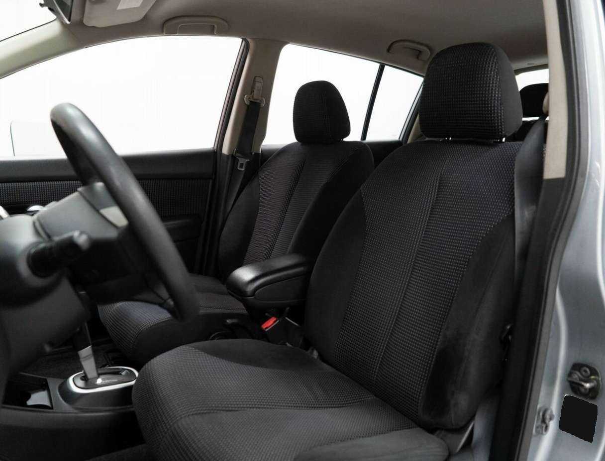 Купить Nissan Tiida с пробегом. Фото: #7