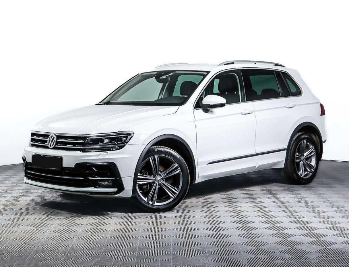 Купить Volkswagen Tiguan с пробегом. Посмотреть фото