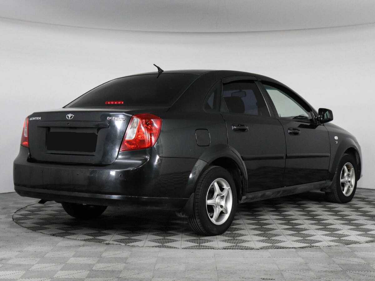 Купить Daewoo Gentra с пробегом. Фото: #2